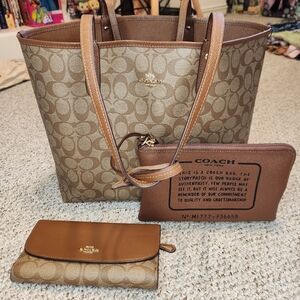 Reversible brown Coach tote with gold hardware and a matching wallet